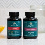 adrenal capsules and womens hormones capsules bottles side by side