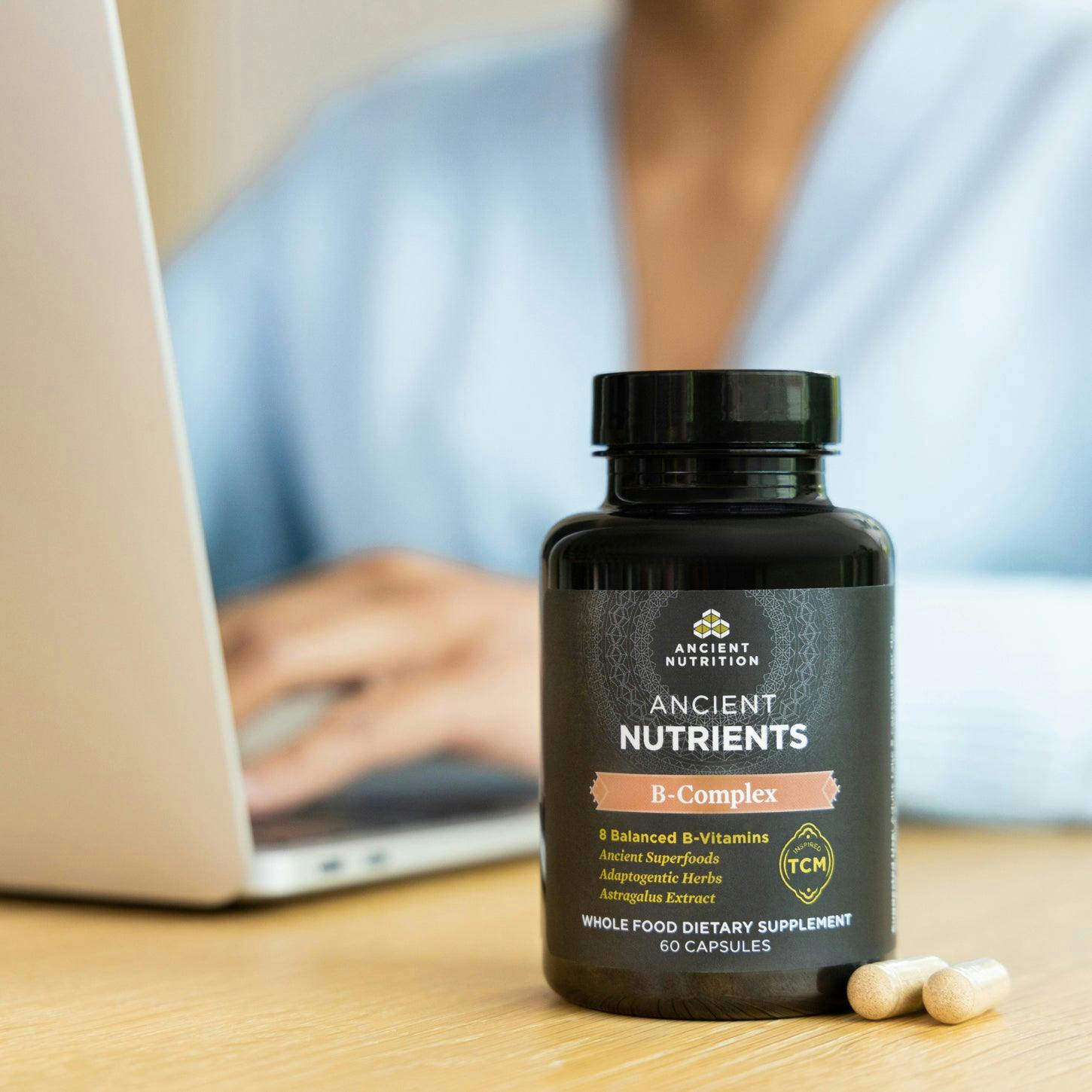 vitamin b complex bottle on a desk