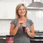 woman drinking multi collagen protein rest and recovery