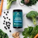 Organic Super Greens + Organic Multi Powder surrounded by fruits and veggies