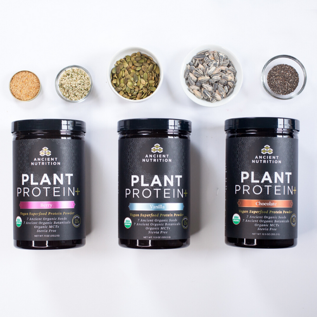 3 bottles of plant protein with bowls of seeds above them