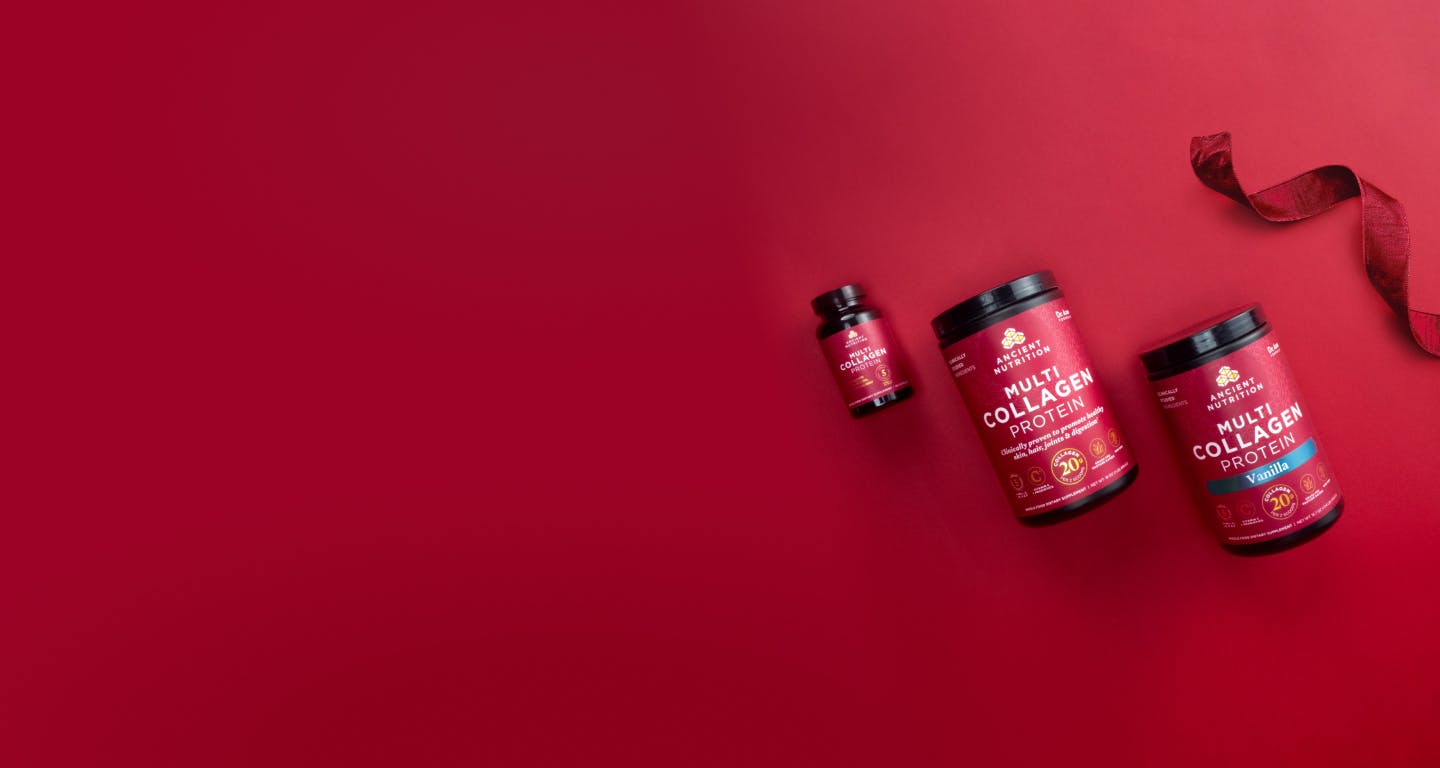 multi collagen protein bottles on a red background with holiday ribbon
