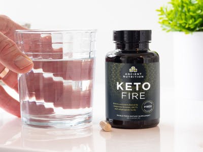 keto fire next to glass of water