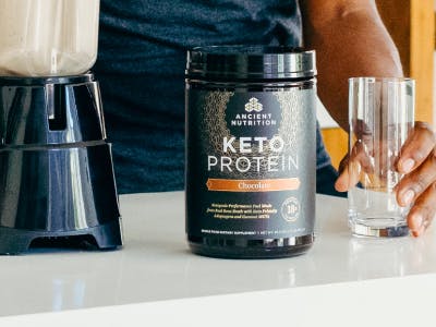 bottle of Keto Protein Chocolate in a kitchen