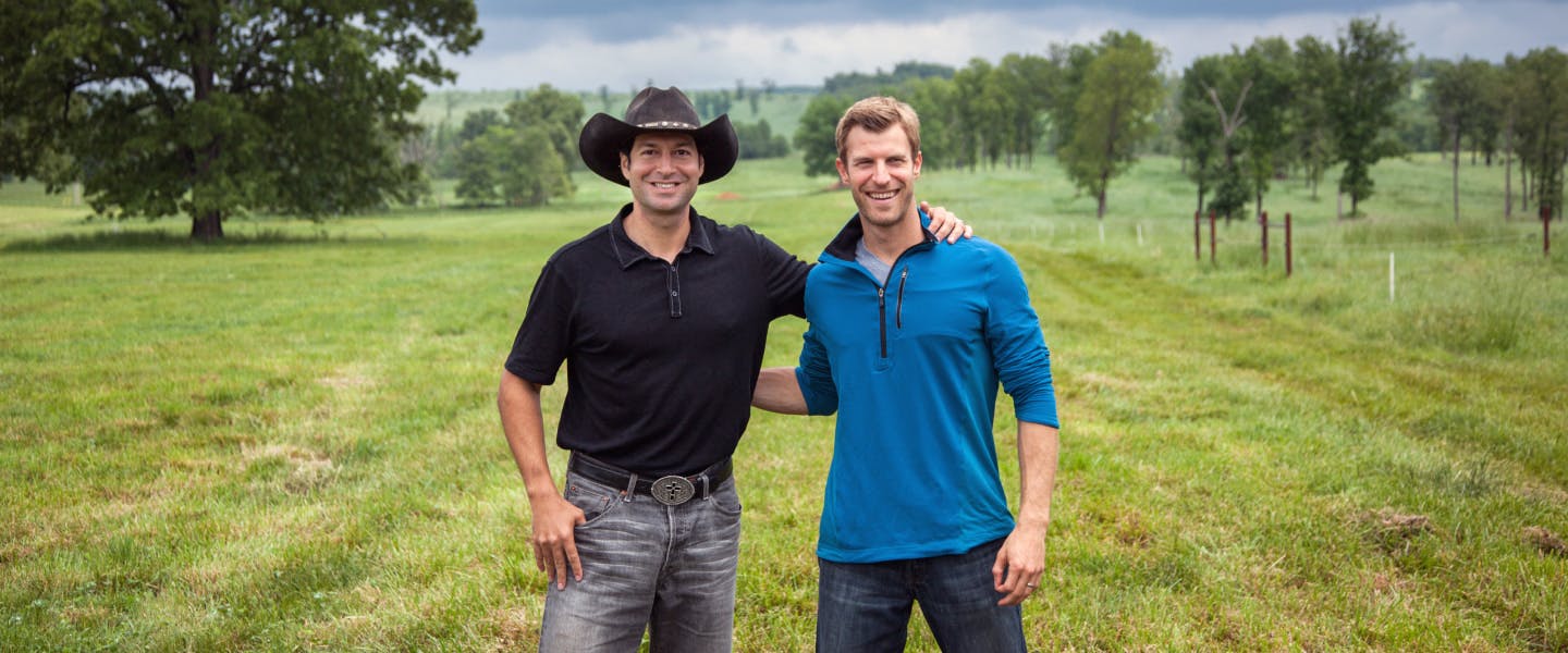 Jordan Rubin and Dr. Josh Axe on a farm