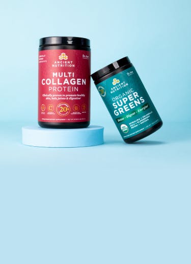 multi collagen protein and supergreens bottles on a blue background