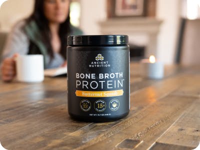 bone broth protein butternut squash bottle on a table