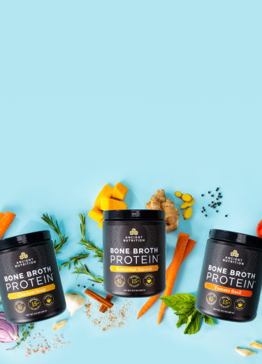 3 bottles of Ancient Nutrition savory bone broth protein on a blue background